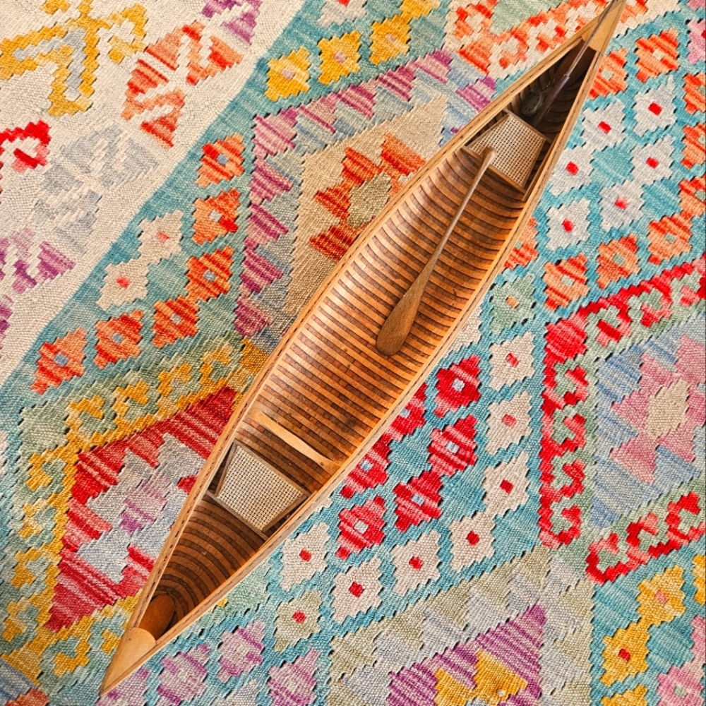 Antique wooden model canoe